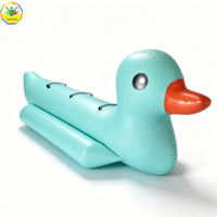 Bateau gonflable commercial en forme de canard pour parc aquatique, loisirs aquatiques en groupe et divertissement en plein air