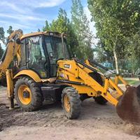 Chargeuse-pelleteuse JCB3cx 4cx originale, polyvalente et efficace, avec une puissance élevée, une faible consommation de carburant et une maniabilité flexible