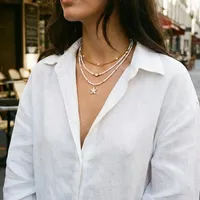 Collar RINHOO Boho Multicapa con Estrellas de Mar, Conchas y Cuentas de Arroz, Collar Vintage para Mujer con Imitación de Perlas, Gargantilla Apilada, Joyería para Fiesta en la Playa
