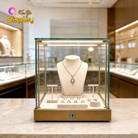 Petite vitrine de comptoir en métal doré avec éclairage LED intégré, écologique, pour présentation de montres et bagues en diamant en showroom