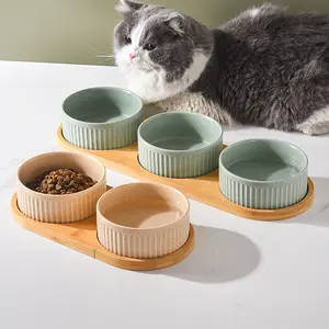 Fabricant vente en gros bol de nourriture en céramique à grain vertical avec cadre en bois pour chat et chien