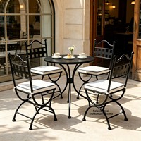 Ensemble table et chaises d'extérieur en fer forgé de style français pour café, restaurant, boulangerie, design vintage décontracté, structure en fer forgé, 4 places