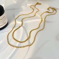 Collier en titane en acier inoxydable plaqué or 18 carats, motif torsades de pâte frite en os de serpent superposées