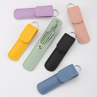 Qcyn Y181 – Kit de nettoyage d'oreilles en acier inoxydable et PU, portable, avec porte-clés, gratte-oreilles spiralé et cuillère à ressort pour l'élimination du cérumen