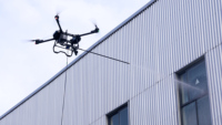 Drone de nettoyage haute pression avec capteur RTK haute précision et anti-collision, pour le nettoyage de fenêtres en hauteur (0-200m)
