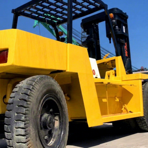 Chariot élévateur TCM 10t d'occasion FD100, moteur diesel, capacité de levage 10000kg, mât 3m, déplacement latéral disponible, matériel logistique portuaire - Product Image 1