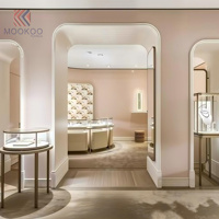 Vitrine de luxe pour bijoux avec éclairage LED, cadre doré sur mesure, verre trempé, qualité commerciale pour la vente au détail haut de gamme