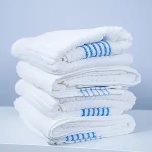 Fabricante al por mayor personalizado 100% tela de algodón logotipo personalizado hilo teñido jacquard toalla