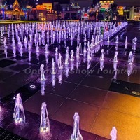 Fontaine musicale de danse de haute qualité, design moderne de tour émiratie, pour festival, carnaval, spectacle de magie avec faisceau lumineux et fumée