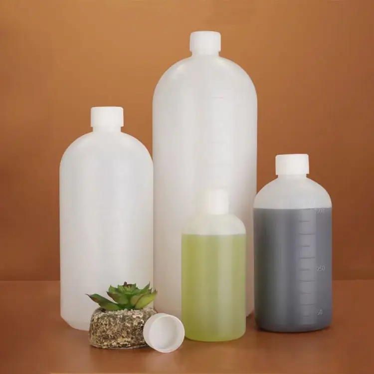 Laboratuvar sıvı kimyasal reaktif şişe ölçekli şişe 500Ml 1000Ml beyaz plastik dar ağız şişeleri eczane kullanımı için iç kap