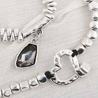 Collier tendance en forme de cœur avec pendentif géométrique à facettes scintillant, accessoire de style unique