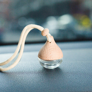 Botella colgante de perfume de coche de cristal redondo al por mayor, difusor de ambientador de 6ml para aceites esenciales con tapa de madera - Product Image 6