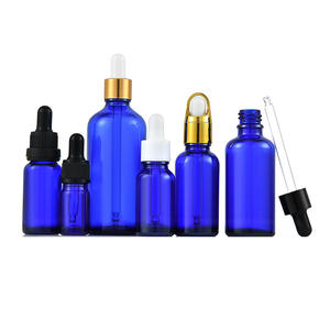 Botella de vidrio azul para aceite esencial de 30 ml, 50 ml, 100 ml con gotero y tapa dorada de rosca - Product Image 1