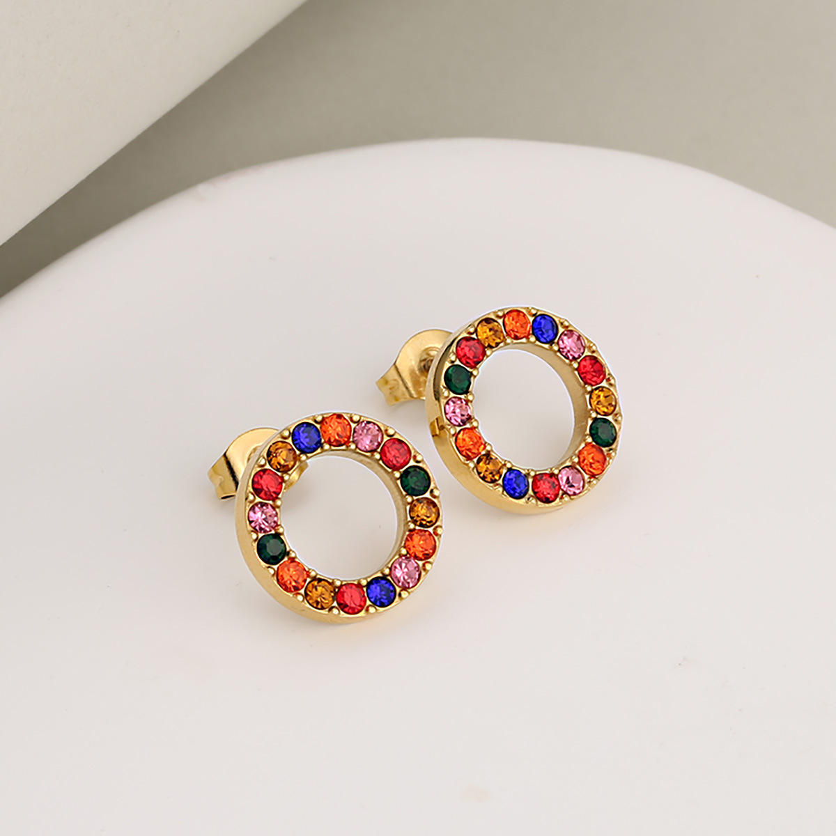 ต่างหูพลอยเทียมสีทองและสี