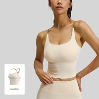 Débardeur de sport long sans coutures pour femme, à maintien élevé et rembourré, avec bretelles spaghetti et dos croisé, idéal pour le yoga, l'entraînement et la gym