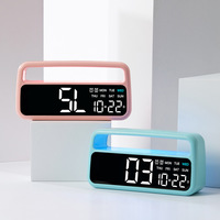 Nouvelle horloge de chevet multifonctionnelle en plastique avec lumière LED ambiante, décoration d'intérieur, horloge de table minimaliste moderne 6655