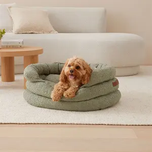 Precio al por mayor Boucle Dog Cave Bed Suave Cálido Grueso Pp Base de algodón Impermeable Lavable Boucle Bed para perros