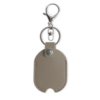 Porte-clés en cuir PU en gros, étui de protection pour clé de voiture en forme de goutte simple, porte-clés avec logo personnalisé en relief, accessoire