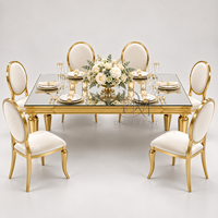 Table de salle à manger rectangulaire haut de gamme en acier inoxydable avec plateau miroir et pieds ronds effilés pour événements et banquets