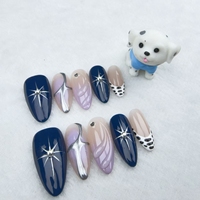 Uñas artificiales uñas almendra forma azul cielo estrellado estilo pintado a mano fábrica de alta calidad al por mayor.