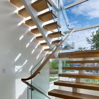 Escalier flottant sur mesure avec marches en bois et balustrade en verre, capacité de charge élevée, gain de place, escaliers intérieurs pour villa duplex