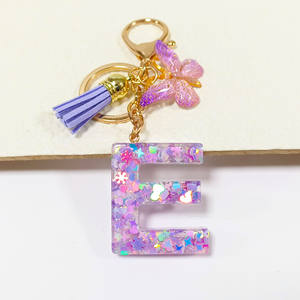 Púrpura copo de nieve corazón resina lentejuelas epoxi acrílico llavero inglés letra diseño estudiante <span class=keywords><strong>mujer</strong></span> bolso encanto colgante - Product Image 3