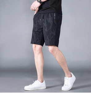 Pantalones cortos de seda helada para hombre, pantalones de cinco puntos, finos, de secado rápido, para verano 2025, nuevos pantalones deportivos de ocio, a la moda y cómodos. - Product Image 1