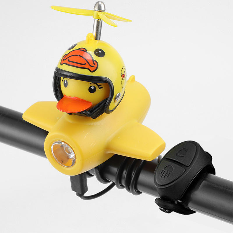 Helmet with horn, airplane light, and rubber duck