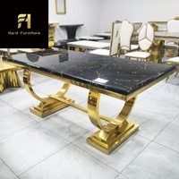 Table à manger de luxe moderne avec plateau en marbre noir et pieds en acier inoxydable doré pour meubles de salle à manger pour maison ou hôtel