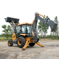 Cargadora retroexcavadora 4x4 versátil con sistema de enganche rápido y accesorios como martillo perforador y horquilla para trabajos multipropósito