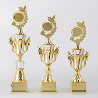 Piala Kompetisi Plastik untuk Lomba Puisi, Lomba Matematika, Lomba Lukis, dan Piala Kenangan Anak-Anak