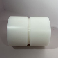 Composant double cylindre usiné sur mesure en nylon PA6 blanc résistant à la chaleur de qualité supérieure pour rouleaux de systèmes de convoyage