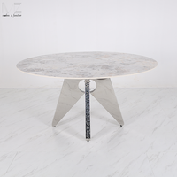 Ensemble de table à manger ronde de luxe moderne de style français du milieu du siècle, avec plateau en pierre frittée, 4 places, et 4 chaises, vente en gros