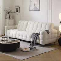 Canapé sectionnel en tissu minimaliste moderne de couleur crème, style Marshmallow, à lignes droites, pour hôtels et petits appartements, à espacement zéro