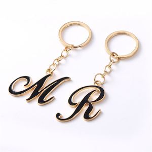 Llavero con inicial, letra del alfabeto negra, chapado en oro, bonito colgante para bolso - Product Image 2