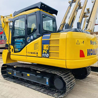 Excavatrice sur chenilles Komatsu PC110-7 d'occasion, 11 tonnes, modèle 2012-2025, capacité de la benne de 0,48 m³, puissance de 65 kW