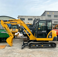 Mini-excavatrice sur chenilles Komatsu PC56 5T d'occasion avec moteur et système hydraulique fiables, idéale pour les travaux de construction et de terrassement