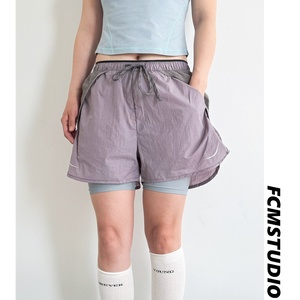 Shorts de <span class=keywords><strong>sport</strong></span> décontractés polyvalents deux-en-un pour hommes et femmes, légers, à taille élastique, séchage rapide, pour l'été et les activités de plein air – Vente en gros - Product Image 2