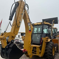 Chargeuse-pelleteuse CAT 416E d'origine en bon état avec une charge nominale de 7200 kg, une puissance de 75 kW, une pompe hydraulique et un moteur à vendre