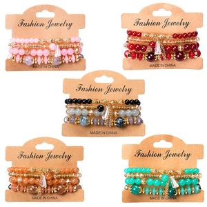 4 طقم أساور أنيقة للنساء على طراز البوهو ، سوار معصم مطلي بالخرز الزجاجي بشراشيب ذهبية ، هدية - Product Image 1