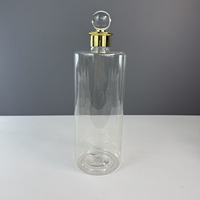 Bouteille vide transparente de luxe Hengjian 1000ml 1L en PET pour gel douche, shampoing, produits capillaires avec couvercle doré, marque privée