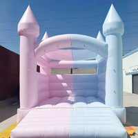 Château gonflable commercial en PVC léger, rose et bleu, avec toboggan et aire de saut