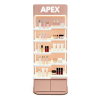 Étagère de présentation cosmétique rose personnalisée avec éclairage LED, présentoir de maquillage et de soins de la peau sur pied pour magasin de beauté