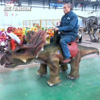 Machine de jeu électrique à monter sur un dinosaure animatronique