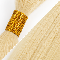Cheveux humains bruts en vrac, qualité usine, cuticules intactes, texture lisse et soyeuse, sans nœuds, pour fabricants d'extensions capillaires.