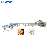 Ligne d'alimentation, de tri et d'emballage automatique pour pain baguette long |   Machine d'emballage automatique pour pain en paine, avec système de mise en filetage et de conditionnement en flux continu