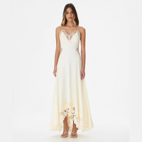 Gaun Maxi Wanita Custom dengan Label Pribadi, Warna Putih Gading, Renda Makrame, Kerah V, Tali Spaghetti, Potongan Asimetris, dan Detail Cut Out