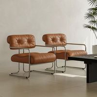 Chaise de salon moderne minimaliste en cuir PU imperméable et résistant aux taches avec structure en métal, chaise de salon ergonomique
