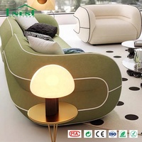 Ensemble de canapés sculpturaux modernes haut de gamme en tissu bouclé avec garniture contrastante, idéal pour les projets d'aménagement intérieur de villas