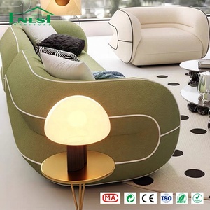 Ensemble de canapés sculpturaux modernes haut de gamme en tissu bouclé avec garniture contrastante, idéal pour les projets d'aménagement intérieur de villas - Product Image 1